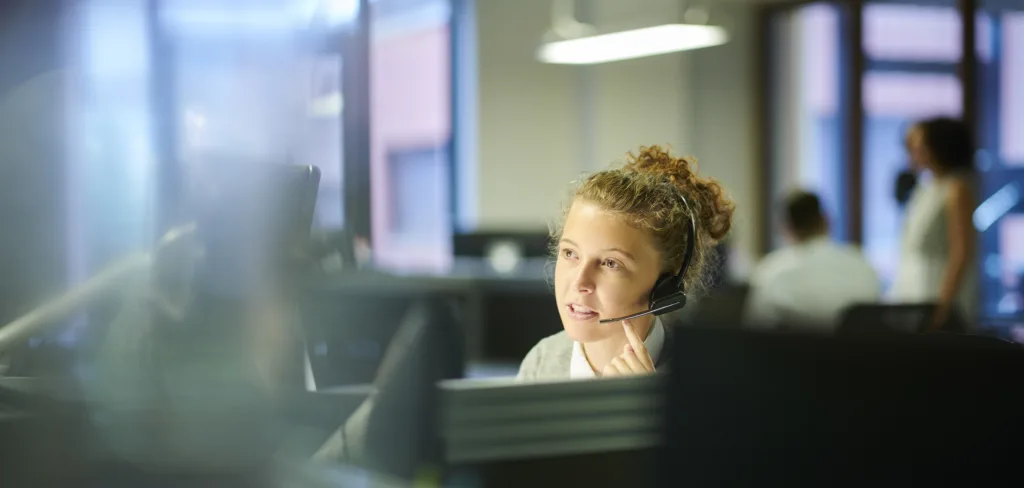 female call center worker with headset on