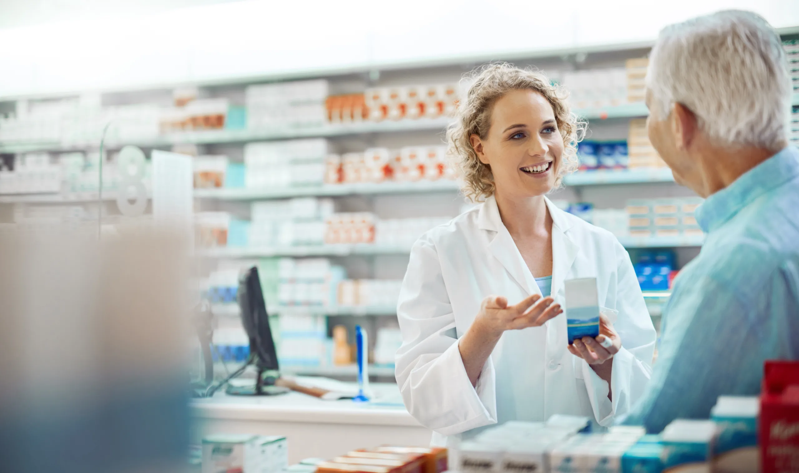 Pharmacist helping a customer