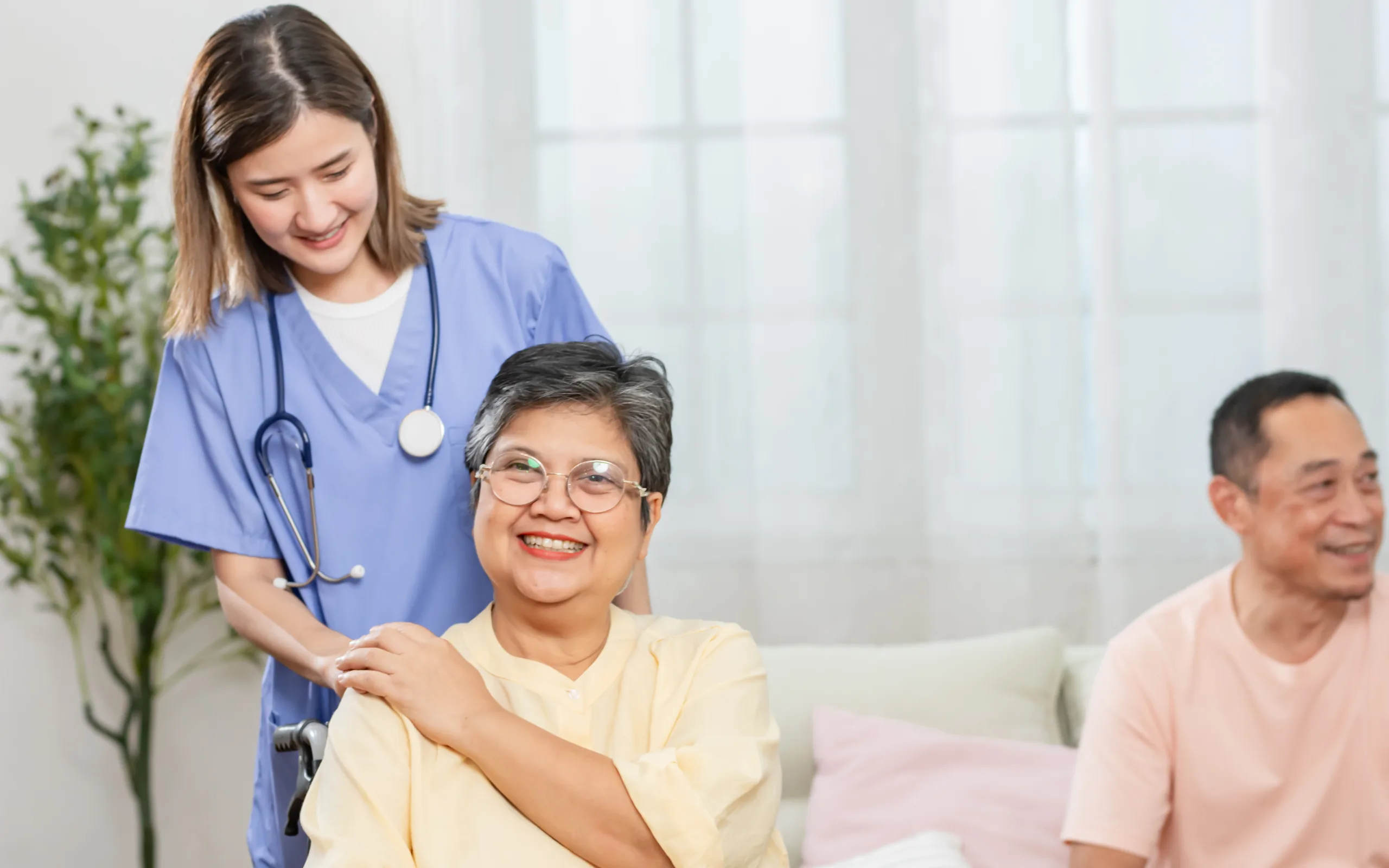 female doctor wearing uniform, smiling with happiness and warmth, taking care senior healthy wellbeing old aging woman on wheelchair. 