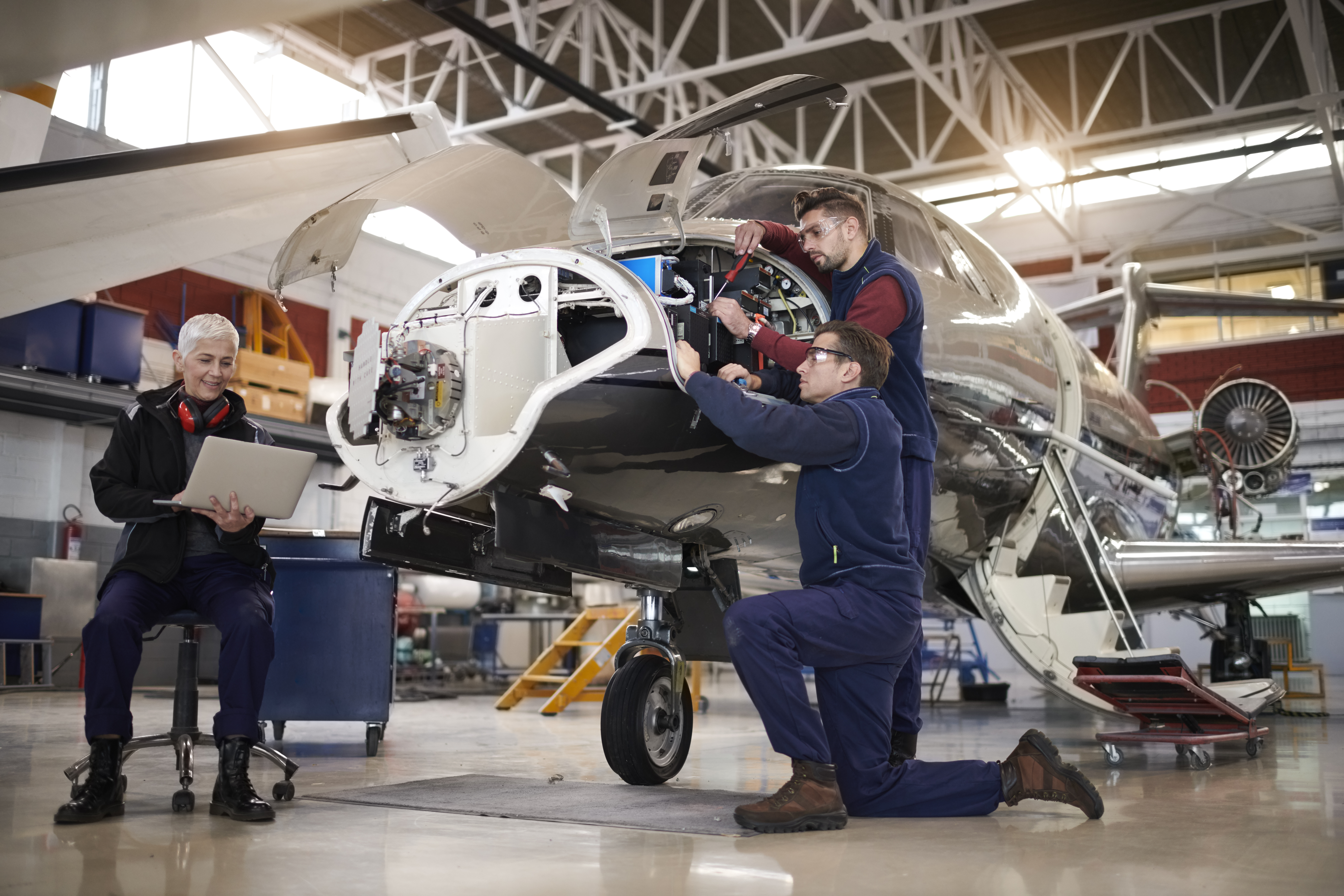 Aircraft mechanics in the hangar