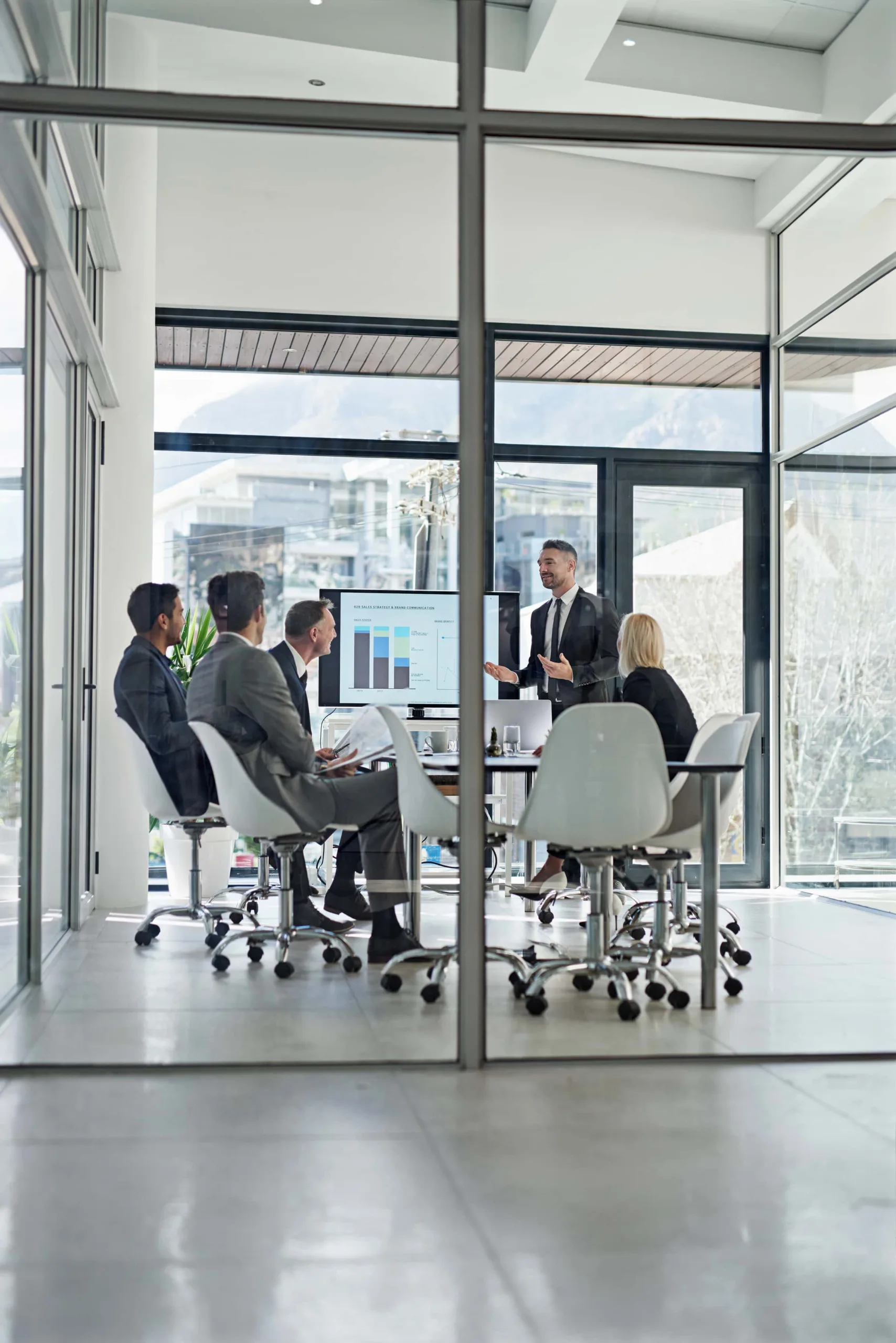 Corporate businesspeople meeting in the boardroom.